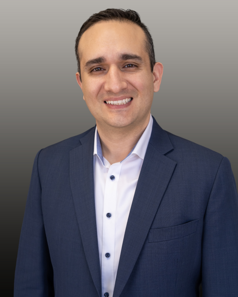 Smiling businessman in navy suit