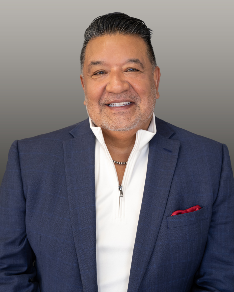 Business portrait: smiling man in navy suit