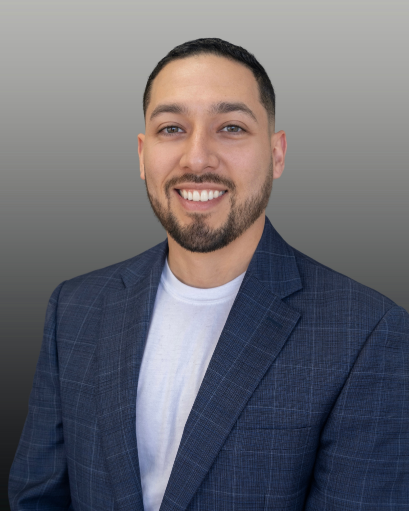 Smiling man in blue blazer portrait