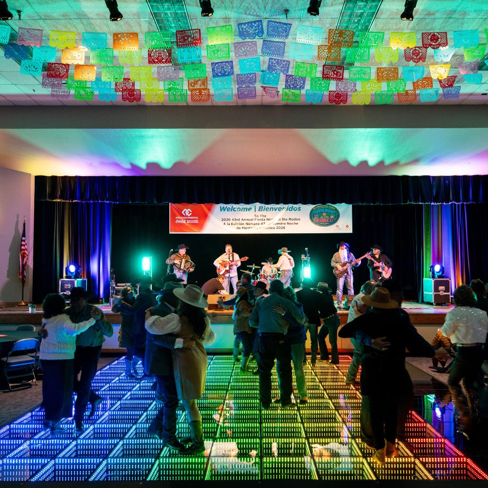Live band with couples dancing on LED floor