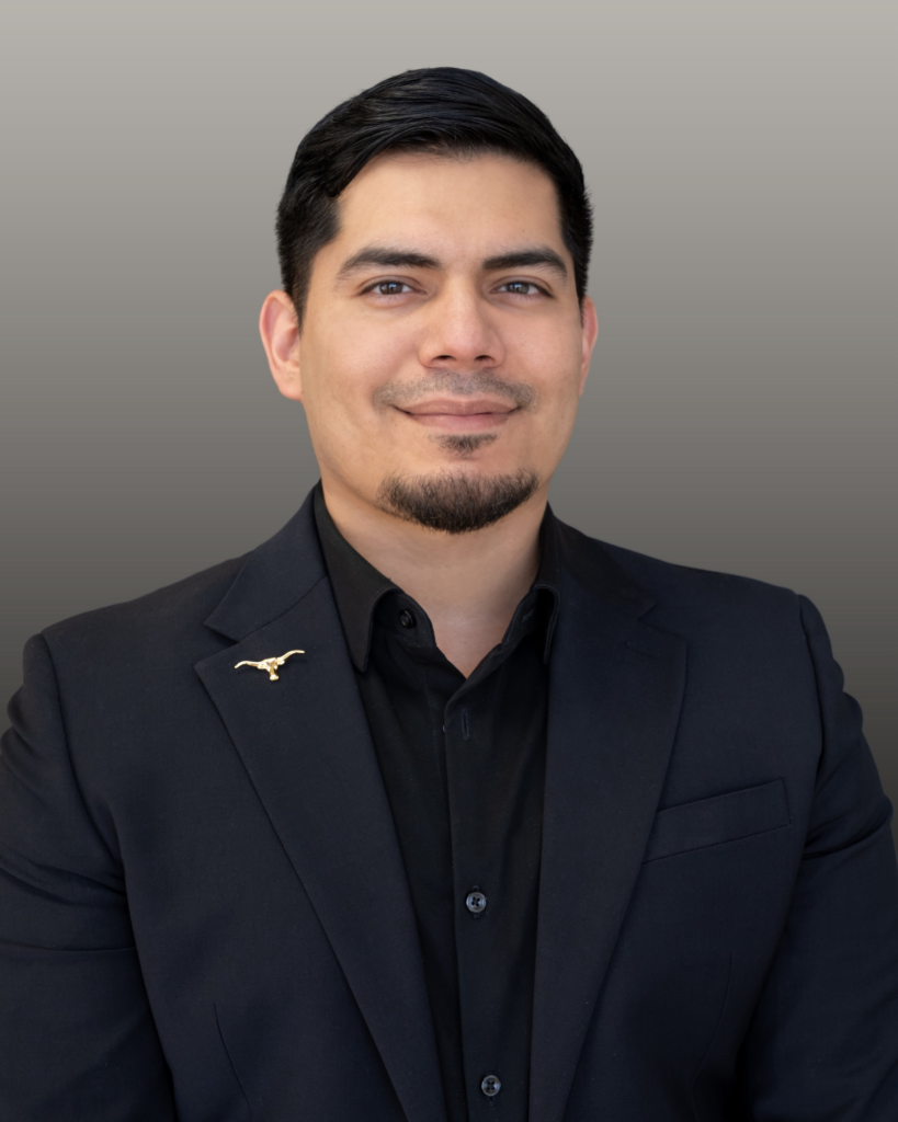 Portrait of smiling man in dark suit