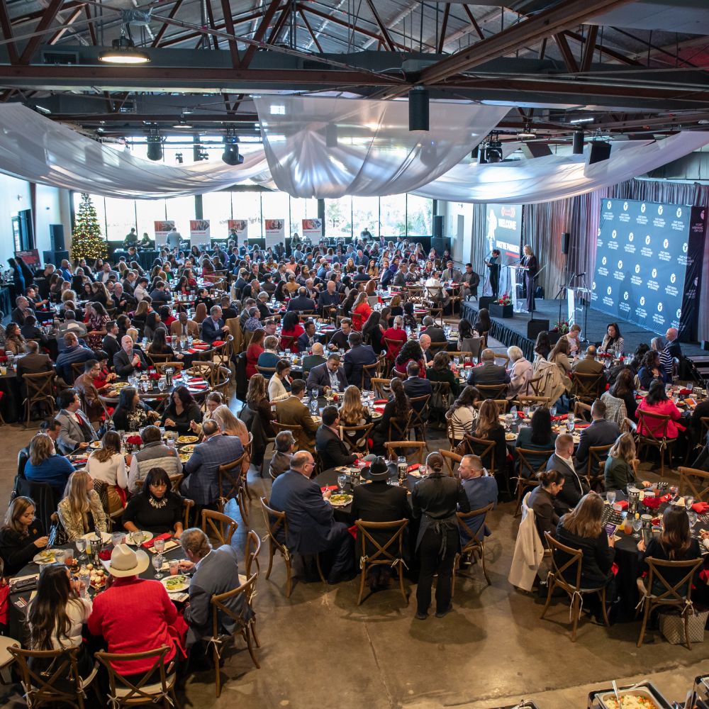 Large conference banquet in decorated event hall