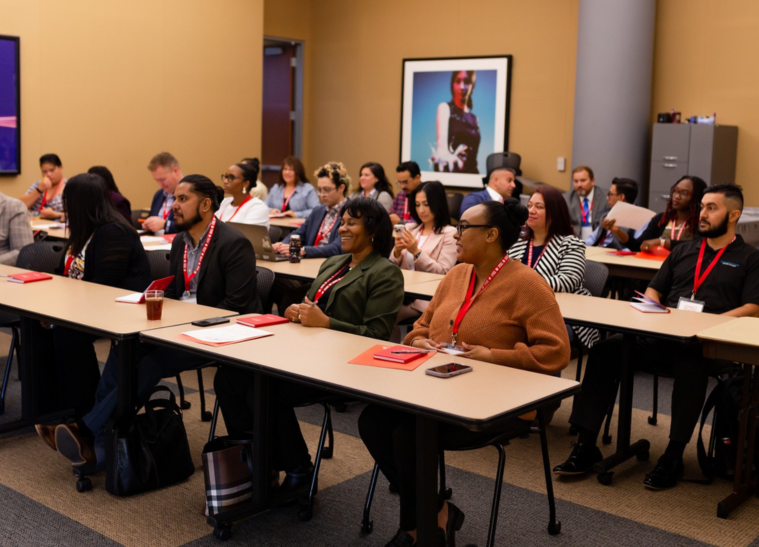 Diverse adults attending a classroom training session