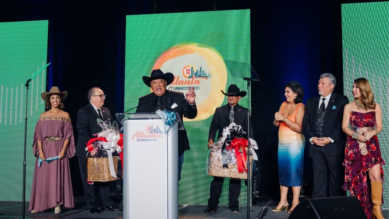 Award ceremony presenters and honorees on stage