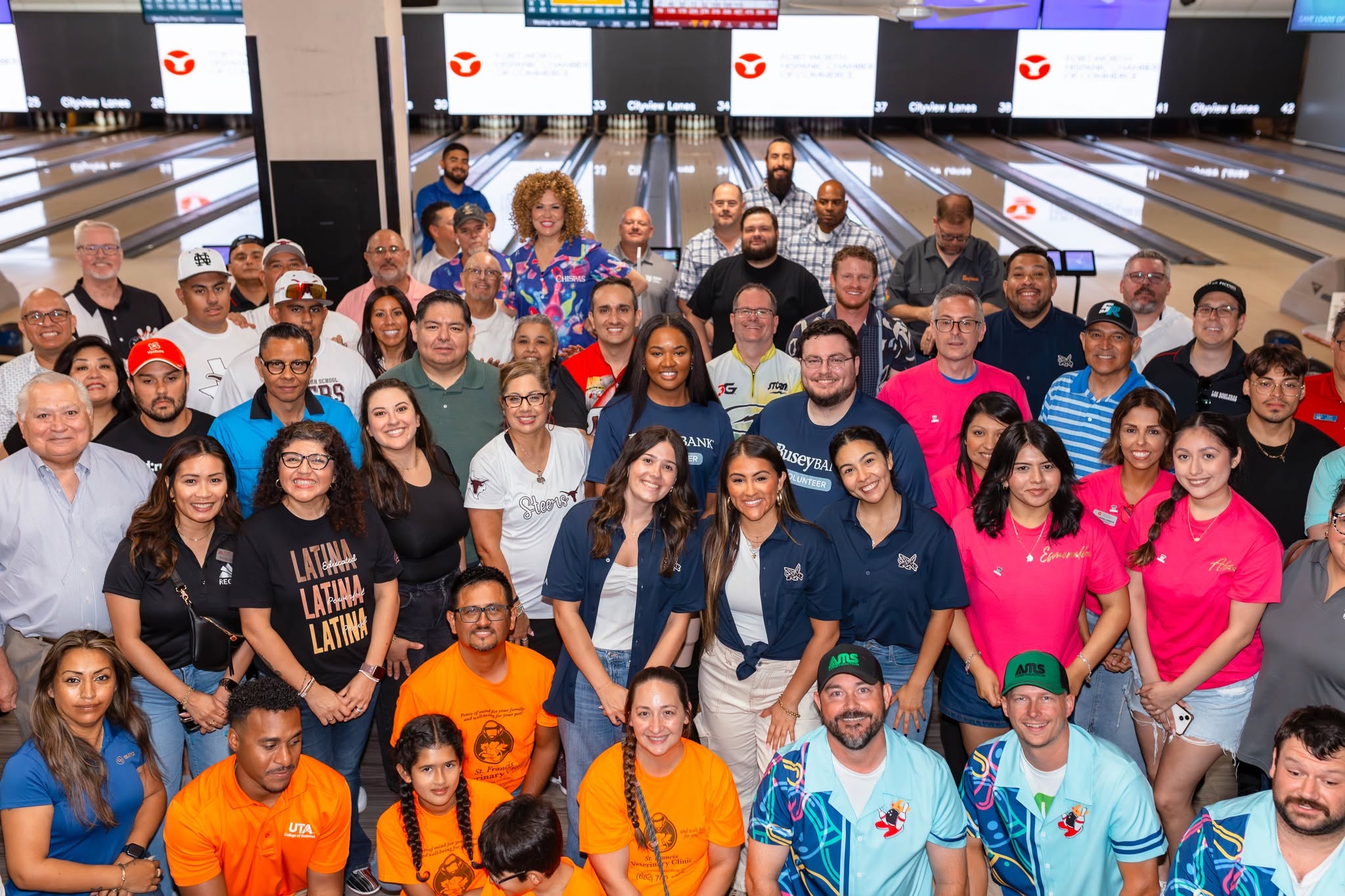 Large group posing in bowling alley