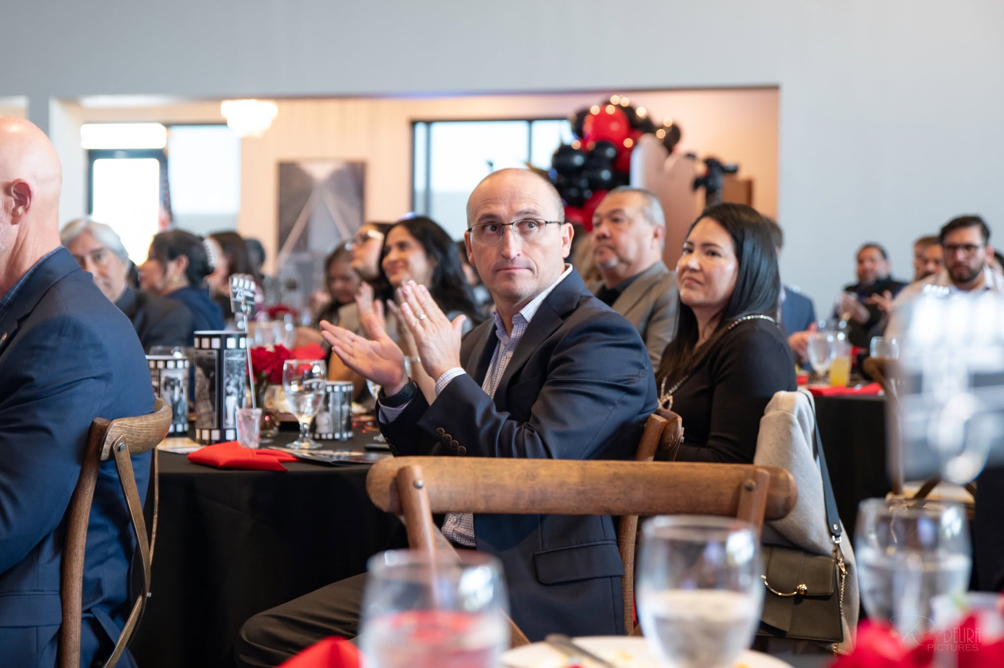 Audience applauding at corporate event