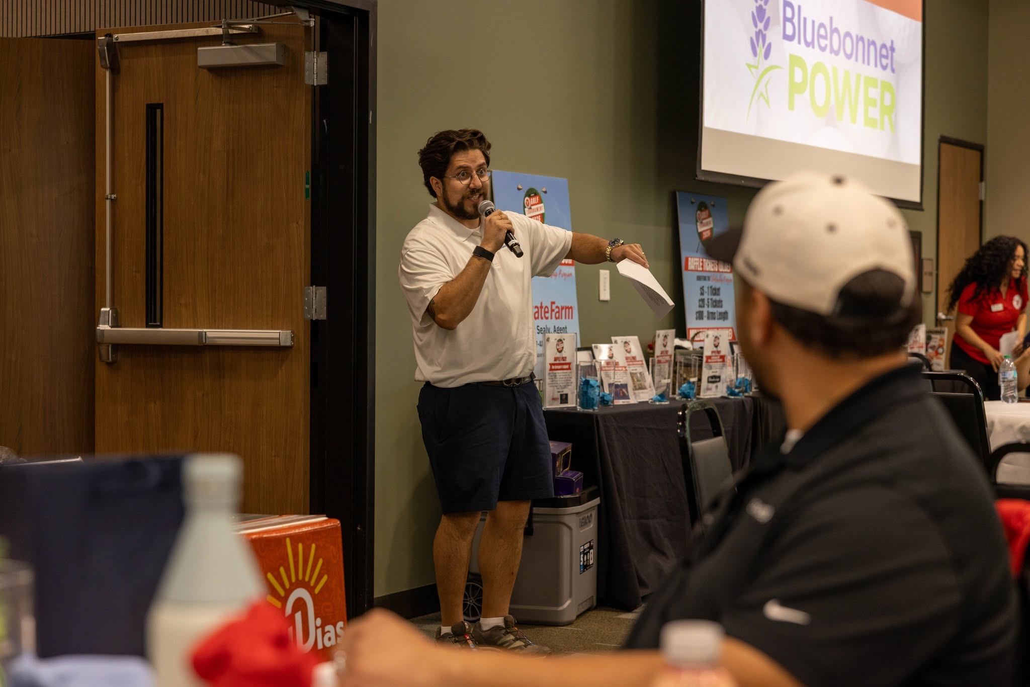 Presenter speaking at Bluebonnet Power event